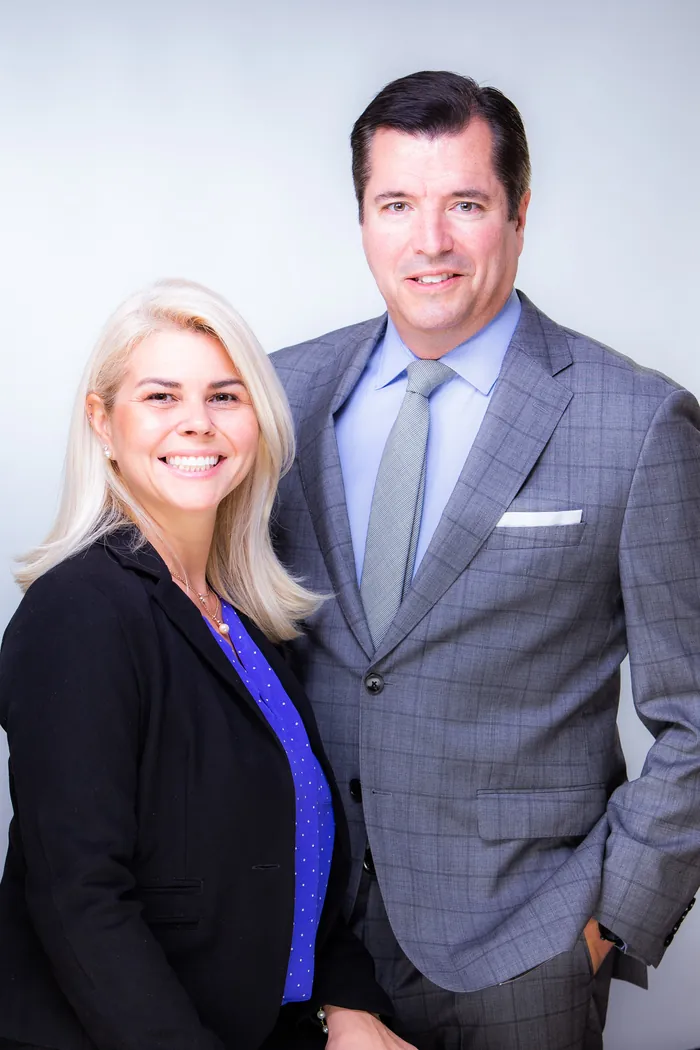 Frank Eskesen standing with Priscila