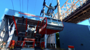 Tram leaving the station at The Roosevelt Island Tramway Upper East Side, NY